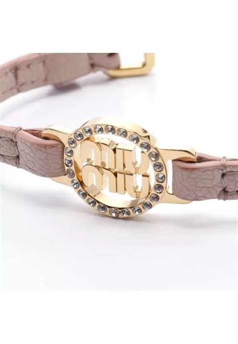 miu miu leather bracelet with heart charm|Madras leather bracelet Orchid pink .